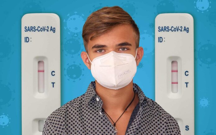 covid-positivo-coronavirus-pandemia-tampone-rapido-uomo-ragazzo