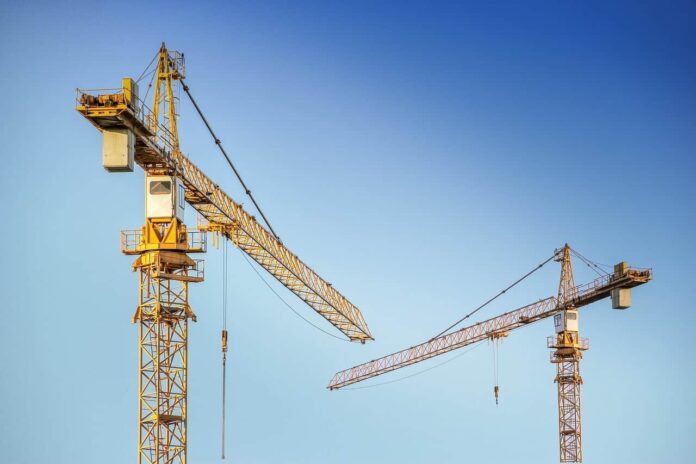 Lavoro lavoratori cantiere gru